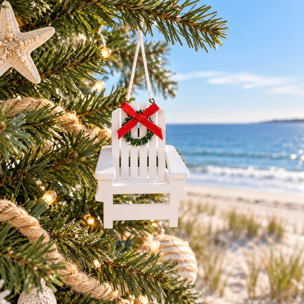 Decorative white Adirondack chair Christmas ornament with a red bow and green wreath