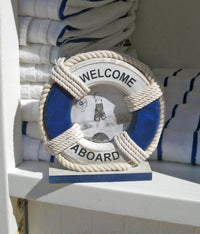 Life Preserver Ring photo frame with nautical rope mounted on a white wood board.