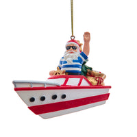 Santa on a motorboat Christmas Ornament.  Complete with presents and coastal vibe.