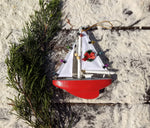 Nautical Sailboat Christmas Ornament with Decorations on Sail